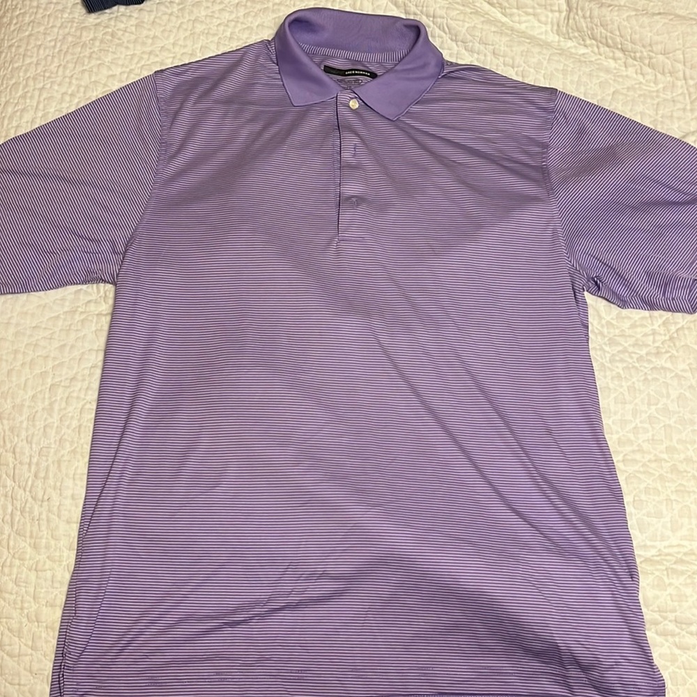 Greg Norman, purple and white golf shirt